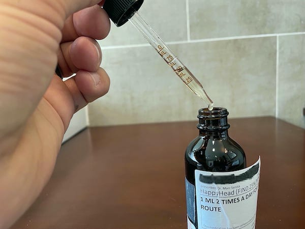 happy head finoxidil