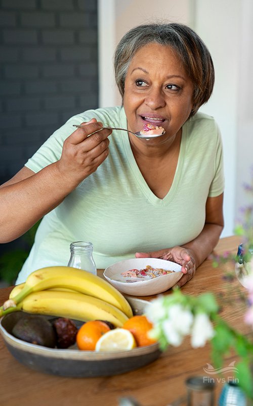 middle aged woman eating